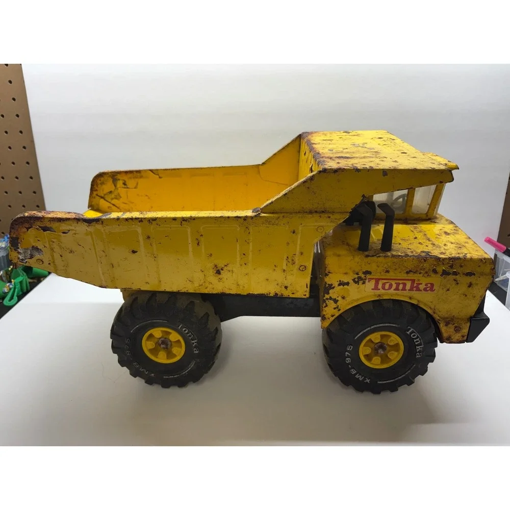 Vintage 1970s Mighty Tonka Dump Truck XMB-975 Pressed Steel Yellow Heavy Duty